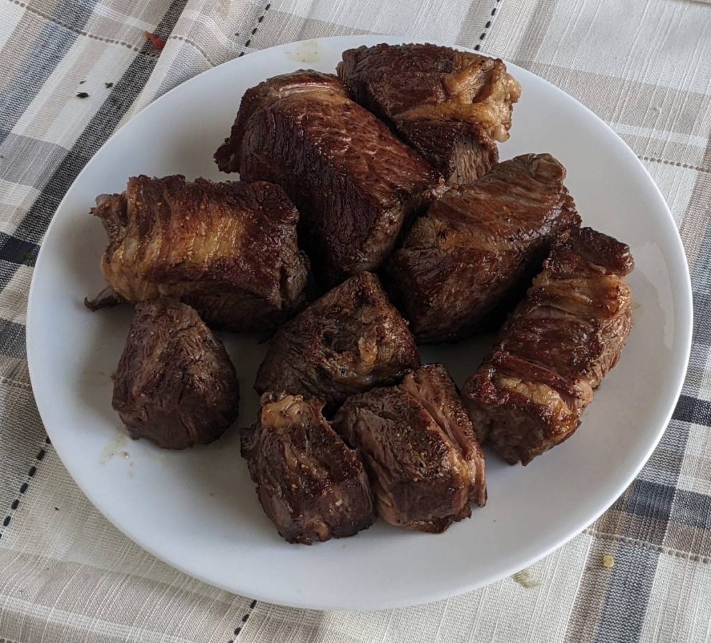 chunks of browned beef on a plate