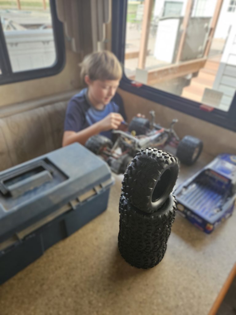 boy playing with a remote control truck