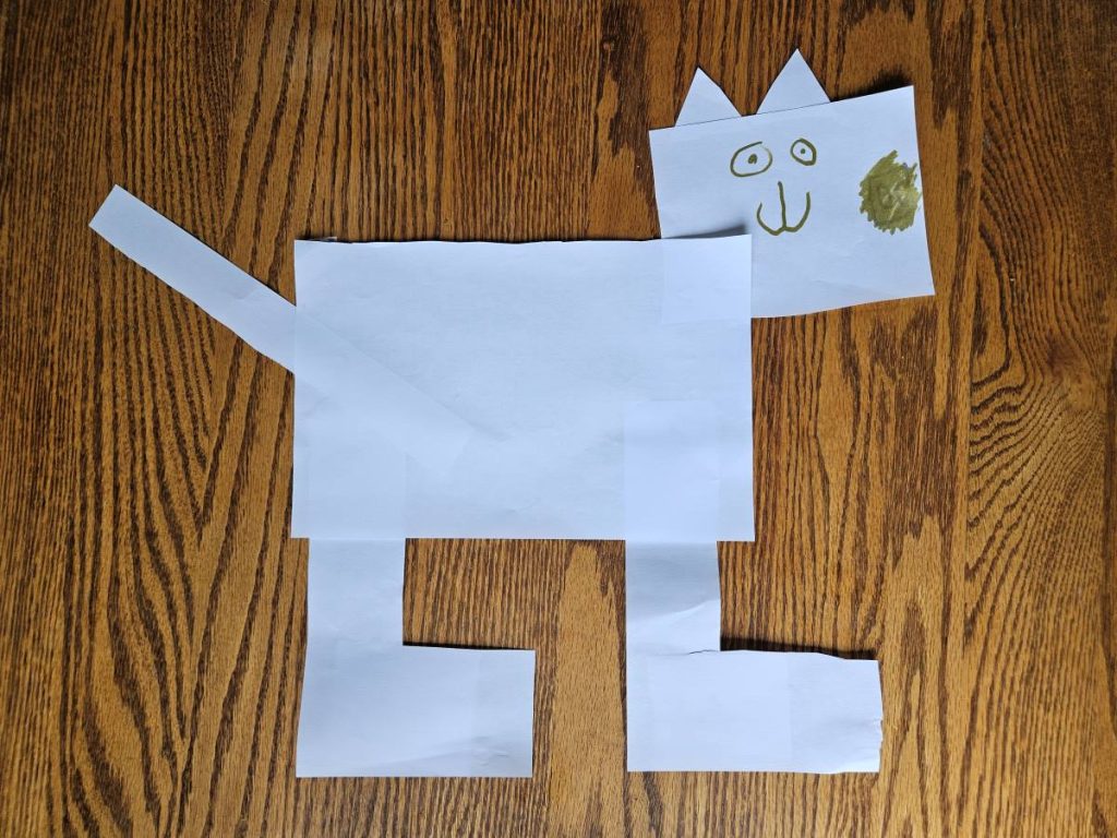 imaginative cat figure made out of paper