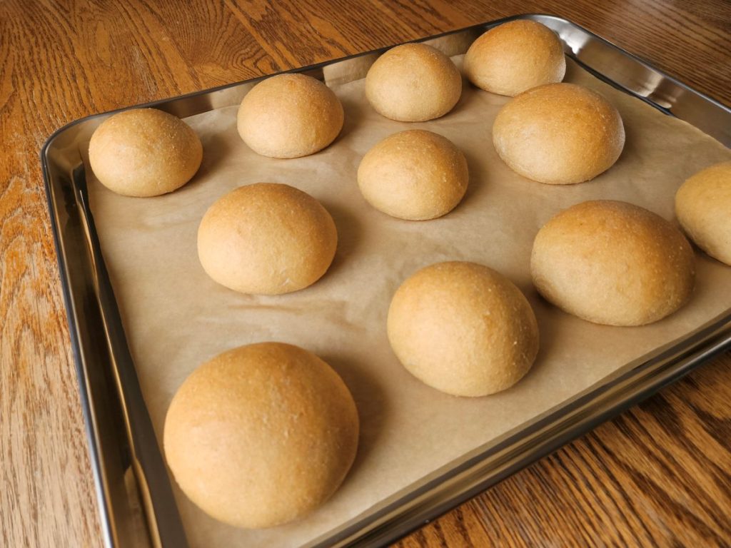 Baking tray of fresh milled flour buns