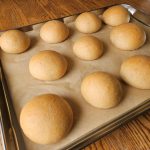 Baking tray of fresh milled flour buns